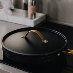 Arvet universallokk 28 cm svart