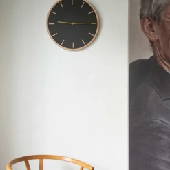 Nero veggklokke 28 cm svart linoleum m/kopper viser