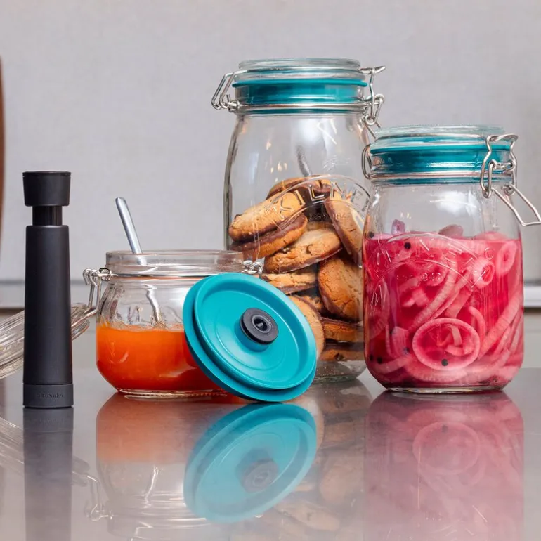 Sett: 3 lokk 1 pumpe 3 stoppers grønn