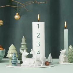 Winter Stories lysestake hjort med kalv